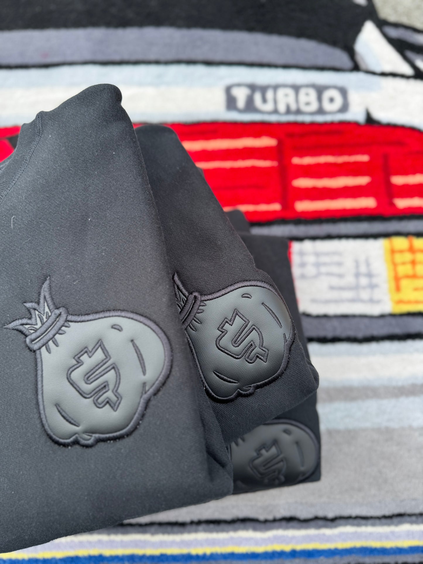 BLACK LEATHER MONEY BAG CREW NECK